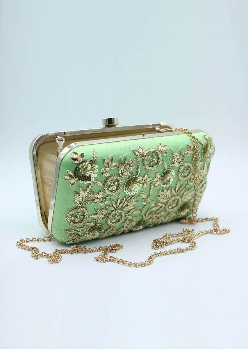 Green sling clutch bag  embellished in zardosi floral embroidery only on Kalki