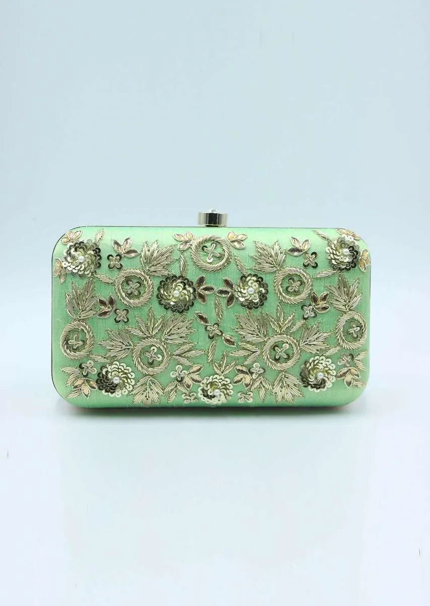 Green sling clutch bag  embellished in zardosi floral embroidery only on Kalki